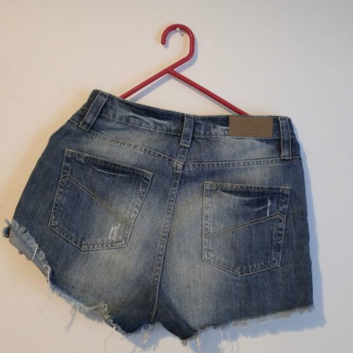 Pink Woman denim shorts size 40 like new with rips