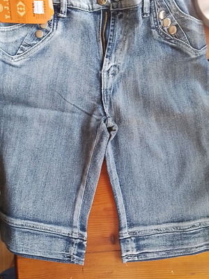 Women's denim shorts brand new with tags, size M/L, blue
