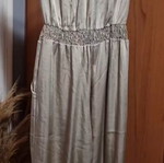 Strapless jumpsuit like new, beige-gold with pockets and elastic waist