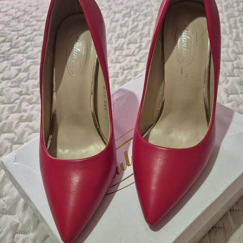 Red high heel pumps
