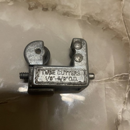 Tube cutter used tool