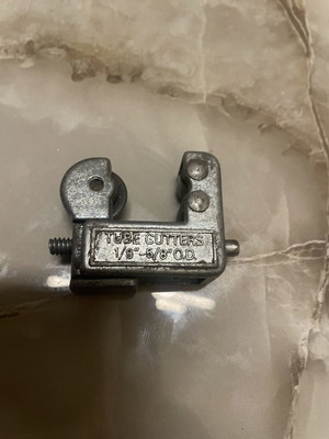 Tube cutter used tool