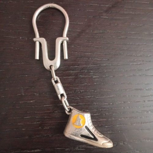 Vintage metal Aris sneaker keychain used