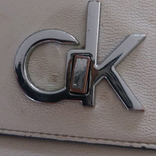 CK shoulder bag made of recycled materials with slight wear