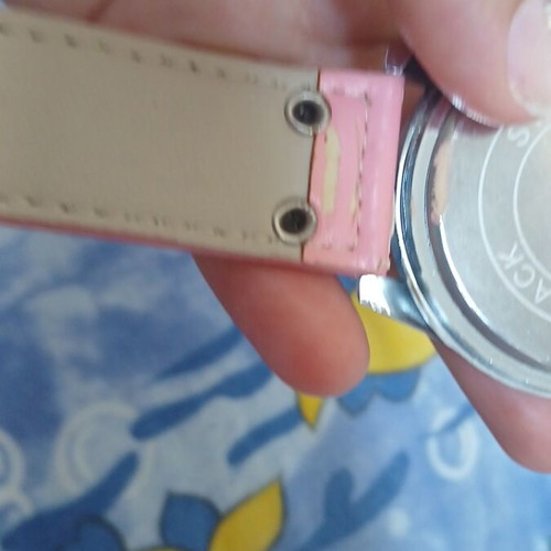 Fashion pink watch with silver used, slight wear