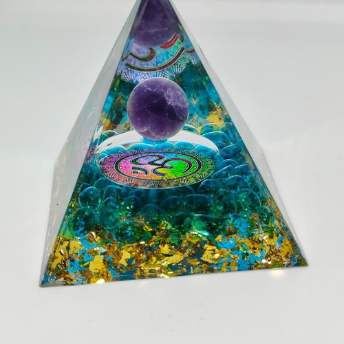 Orgonite pyramid with amethyst and Om symbol like new