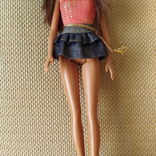 Barbie doll by Mattel like new with denim skirt and gold details