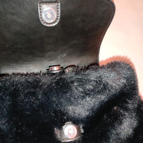 Faux fur mini backpack used, black