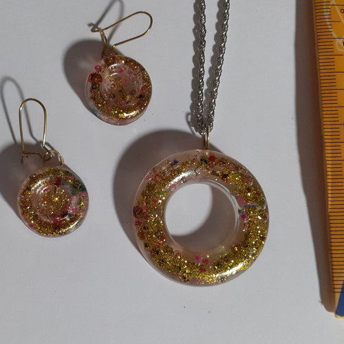 Two sets of handmade pendants and earrings, multicolor