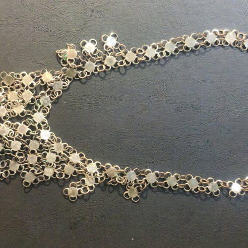 Vintage necklace used with turquoise stones and plated metal