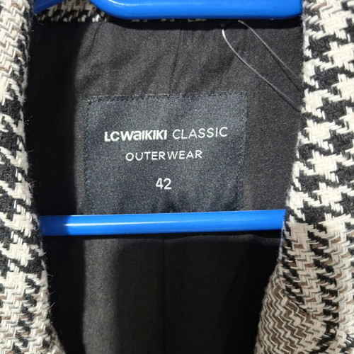 Women's black and white coat new, size XL
