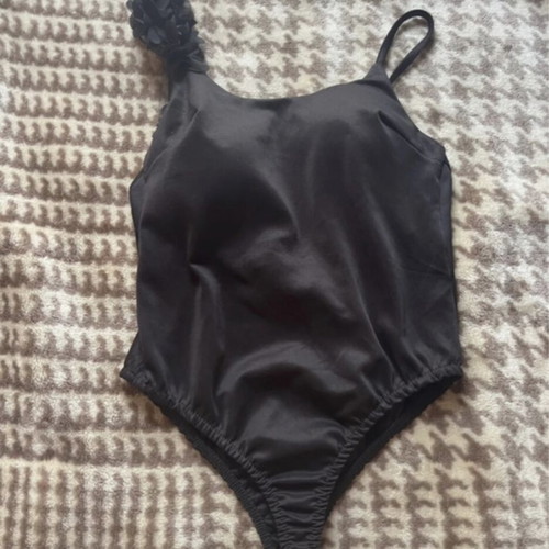 Bodysuit like new, black, without fasteners with padding