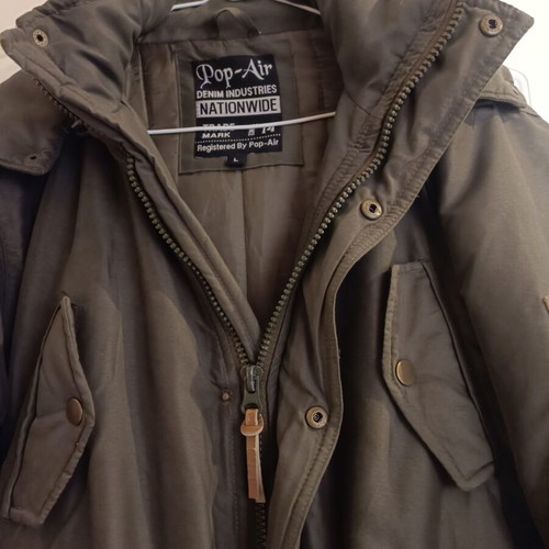 Men's jacket used, size large, with small defect