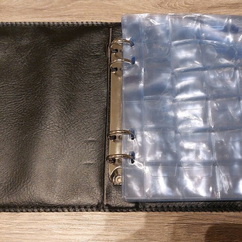 Mini Coin Collection Album like new with 20 sleeves of 24 slots each