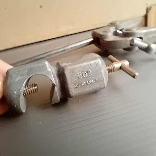 Old laboratory tools used for holding test tubes and bottles
