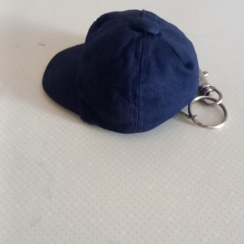 Collectible keychain in hat shape like new