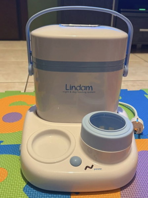Lindam 2-in-1 bottle warmer 5-7 minutes and portable cooler new