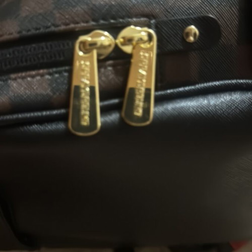 Sprayground backpack like new, brown and black
