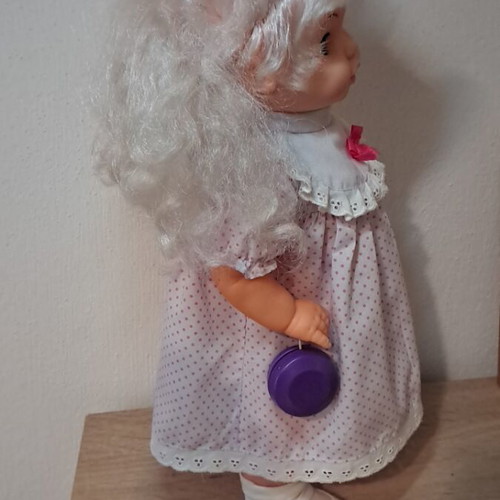 Vintage Anna doll with yo-yo in hand used