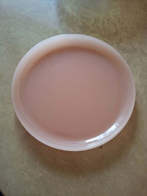 Vintage decorative plate in soft pink opaline glass like new