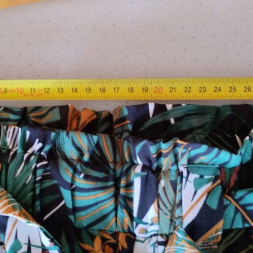 Pants with green and black tropical pattern new, size M