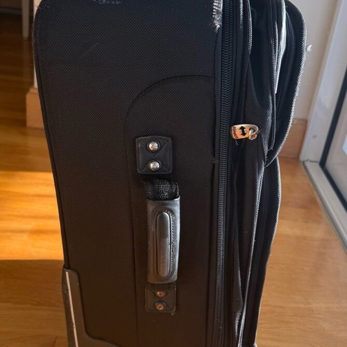 Delsey suitcase used with wheels small size black