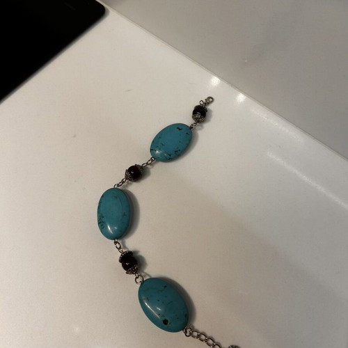 Summer bracelet with blue stones and black beads