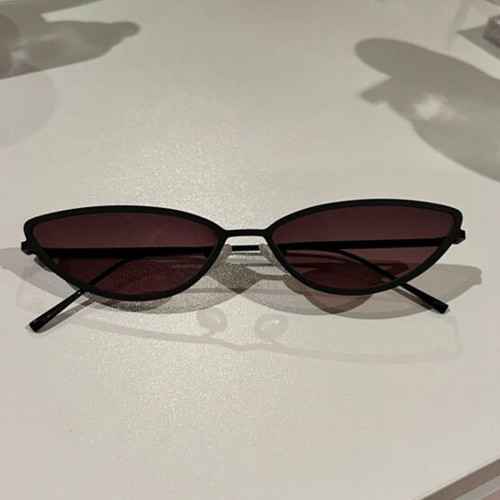Sunglasses new with thin black frame and pink lens