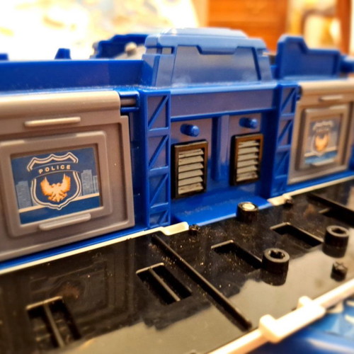 Airplane toy used with lights and sounds, transforms into station