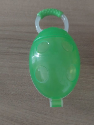 Pacifier case green like new with fruit feeder base