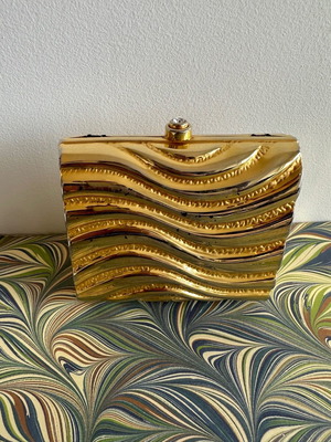 Gold evening bag used with chain