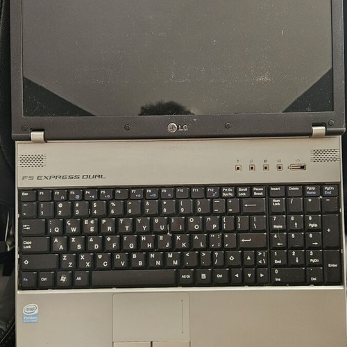 Vintage Toshiba Satellite L300 and LG F1 laptops used for repair or parts