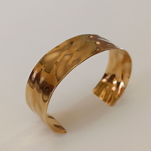 Steel bracelet cuff new with embossed designs gold color