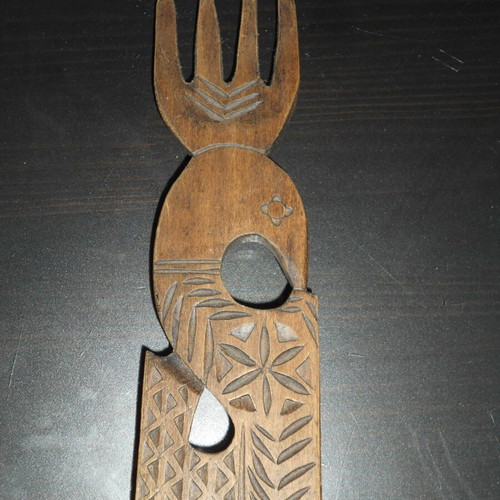Carved wooden spoon with fork rustic kitchen decoration used