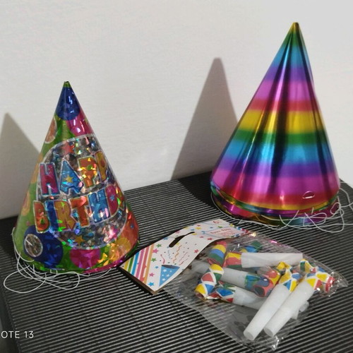 Party supplies new, 12 hats and 6 whistles