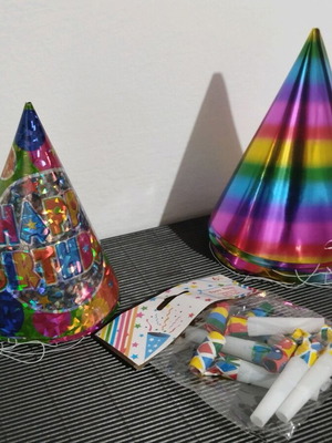 Party supplies new, 12 hats and 6 whistles