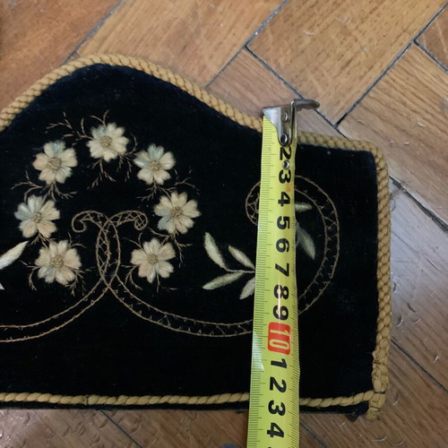 Traditional embroidery used, dark velvet