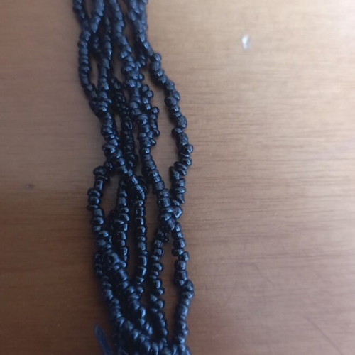 Black necklace with beads and plastic spade-shaped elements like new