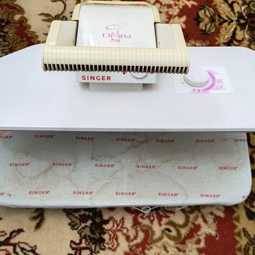 Singer ironing press used