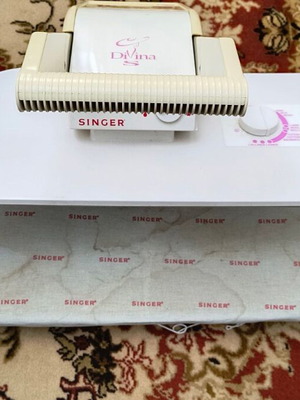Singer ironing press used