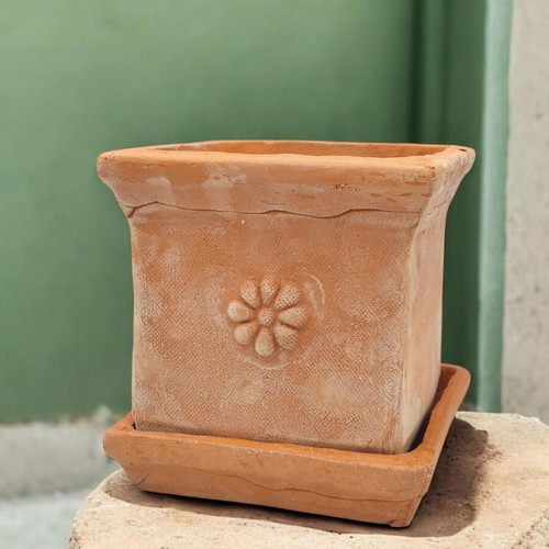Square ceramic pot new from high-quality clay with saucer