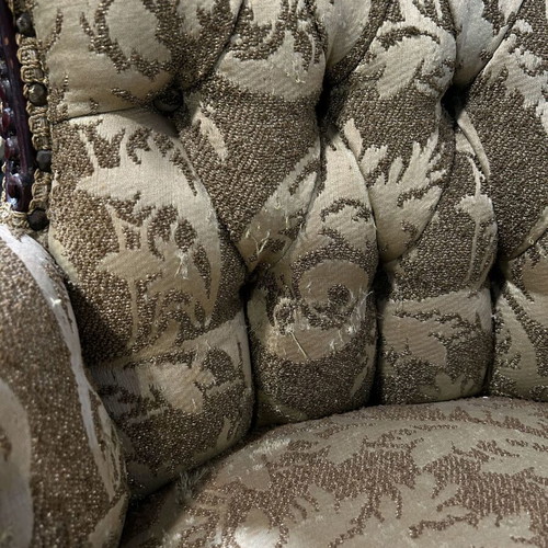 Hollywood Regency tufted armchairs used, mahogany carvings, set of two