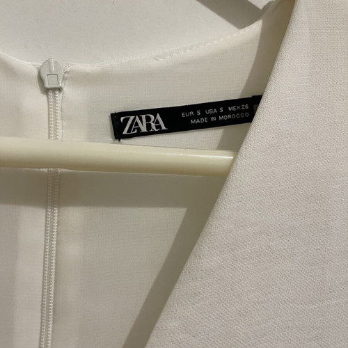Zara white wide-leg jumpsuit with shoulder pads