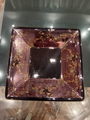 Glass embossed serving platter used, square with damask and gold details