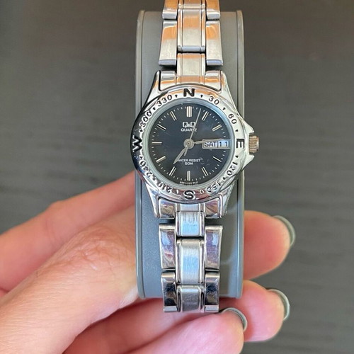 Q&Q Women's Watch with Silver Metal Bracelet like new