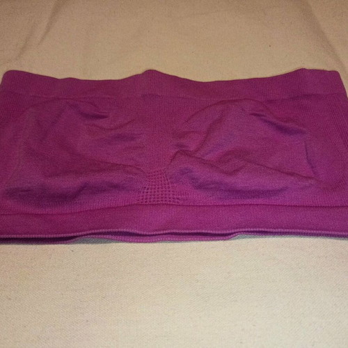 Women's latex bustier like new, pink strapless without padding