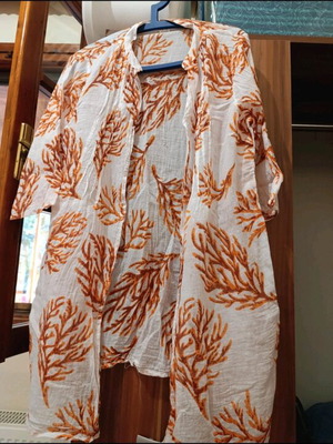 Transparent shirt like new, ideal for the sea