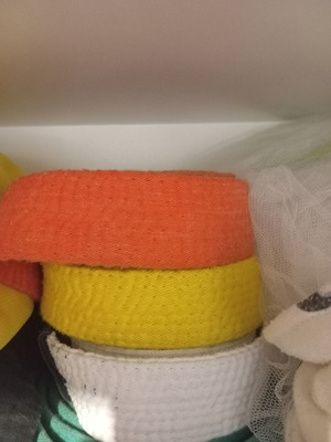 Karate belts orange, white, yellow