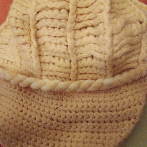Handmade jockey hat used, yellow with white cord