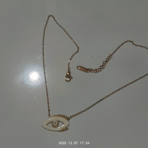 Thin gold-colored necklace used